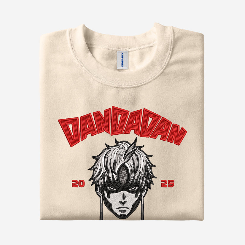1- DANDADAN - MAL DE OJO - CAMISETA